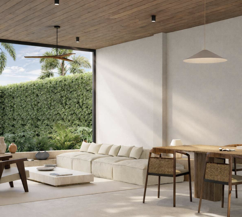 Vista Azul open living and dining space overlooking greenery