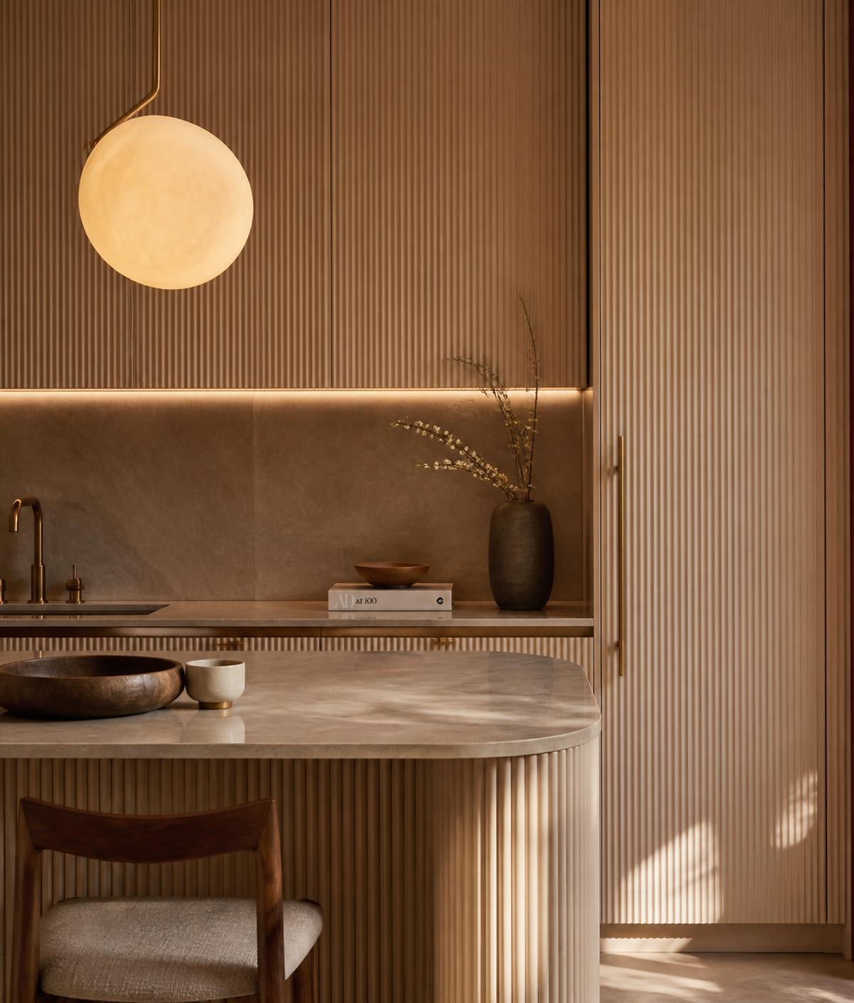 Fluted kitchen with globe pendant